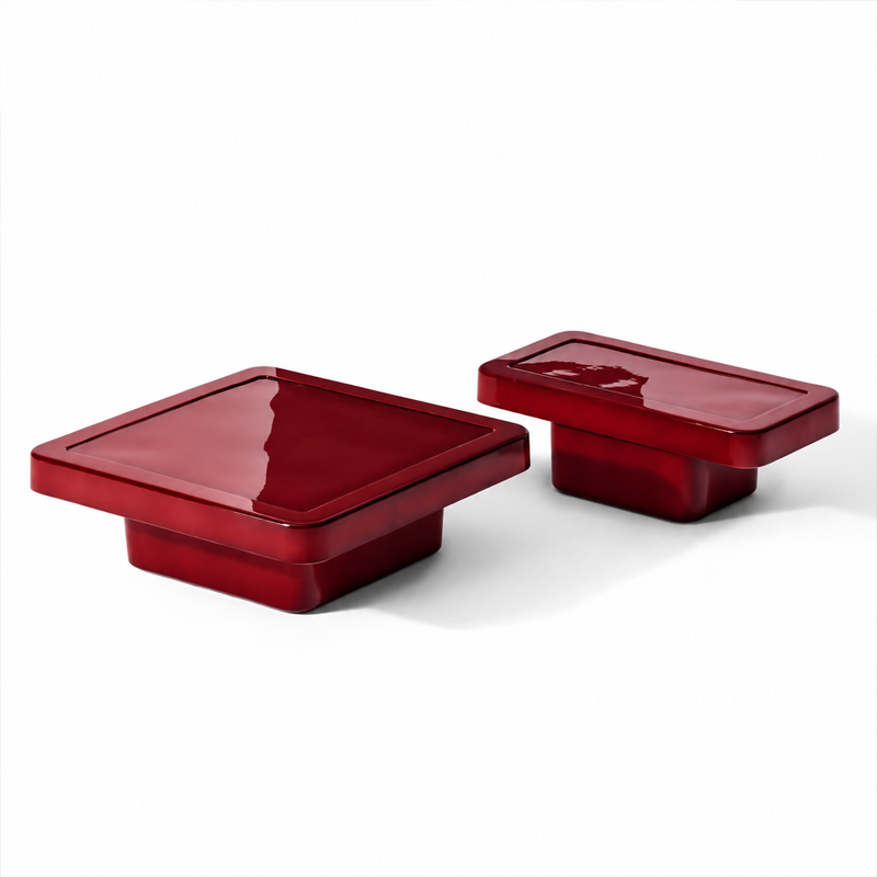 Deux tables basses Ardys Cassina en béton laqué rouge amarante
